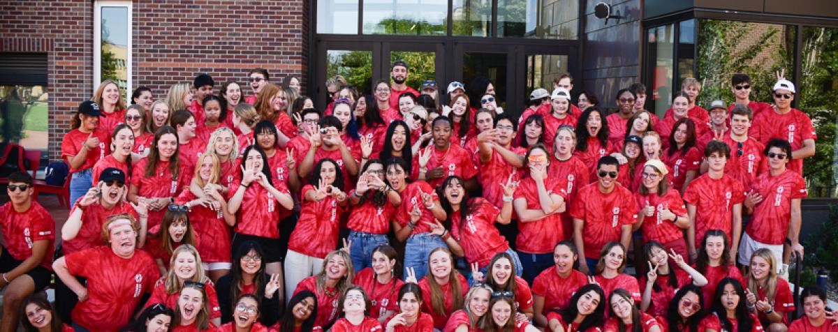 2023 4D Peer Mentors on the steps of the Community Commons
