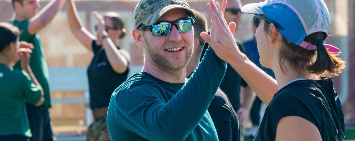 Hero Games participants giving each other high fives